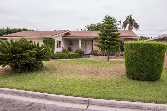 Wonderful curb appeal here in a great neighborhood. A professionally sculpted Sega Palm, Star Pine, and gorgeous Cypress with a Lush brick lined planter.