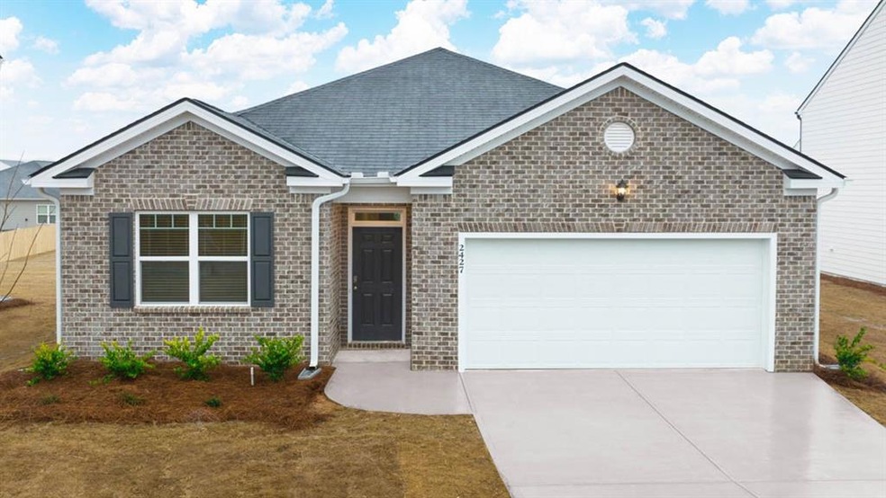 View of front of home featuring a garage
