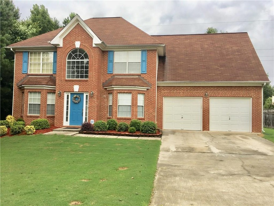 BRICK FRONT WITH BAY WINDOWS