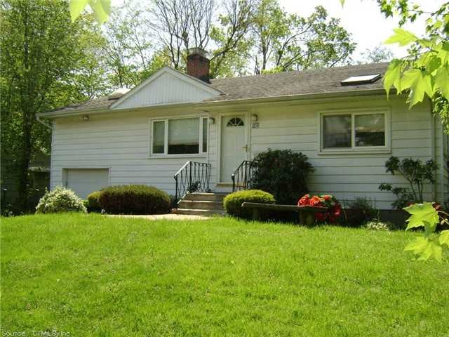 Exterior Front. This split level home boasts over 