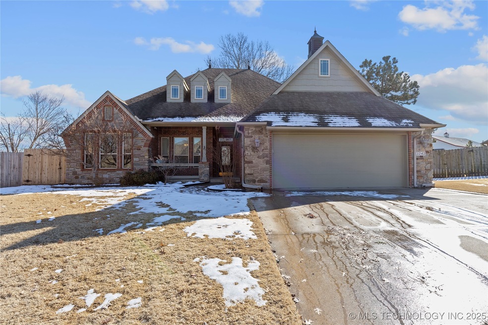 Traditional Home w/ Brick and Stone Exterior