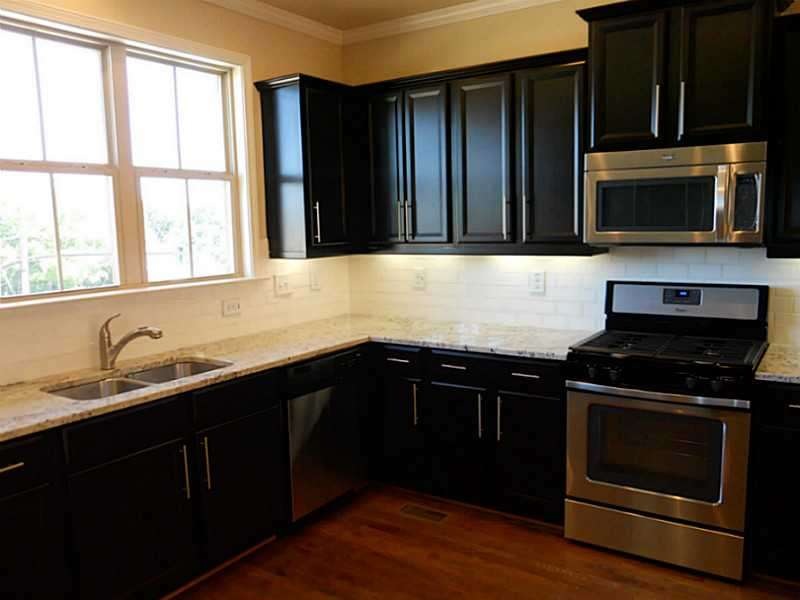 Kitchen. Kitchen with Espresso Cabinets and Stainl