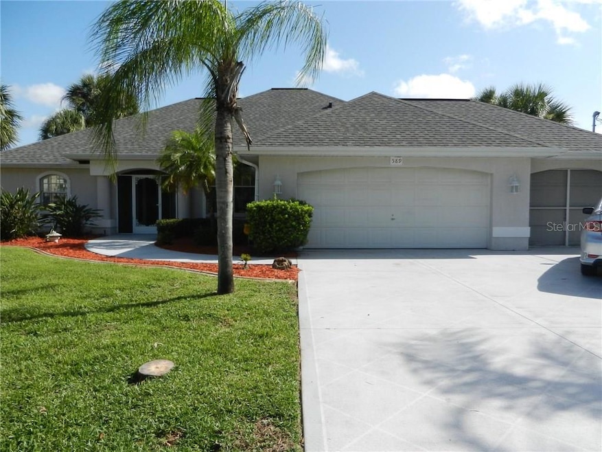 589 Rotonda Cir, Rotonda West, FL 33947 - photo 1