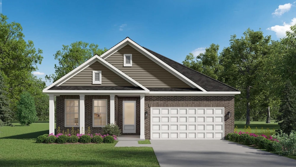 View of front of house featuring brick siding, a garage, a front yard, and concrete driveway