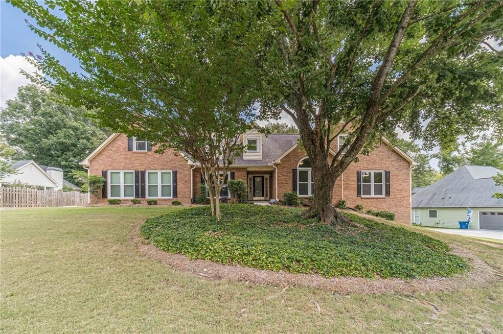 View of front of home featuring a garage and a fro