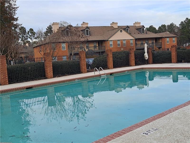Beautiful gated 4-side brick Hampton Arbors comple
