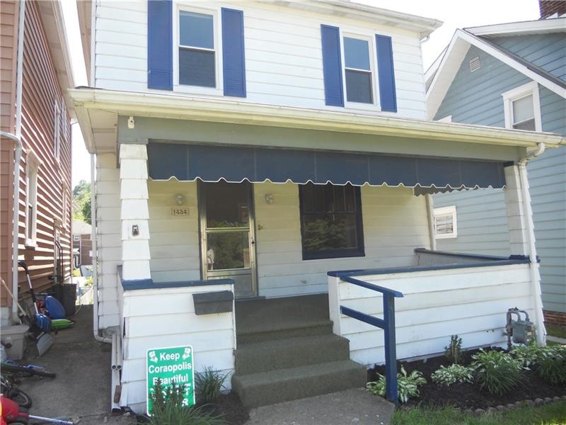 Large inviting front porch to relax on