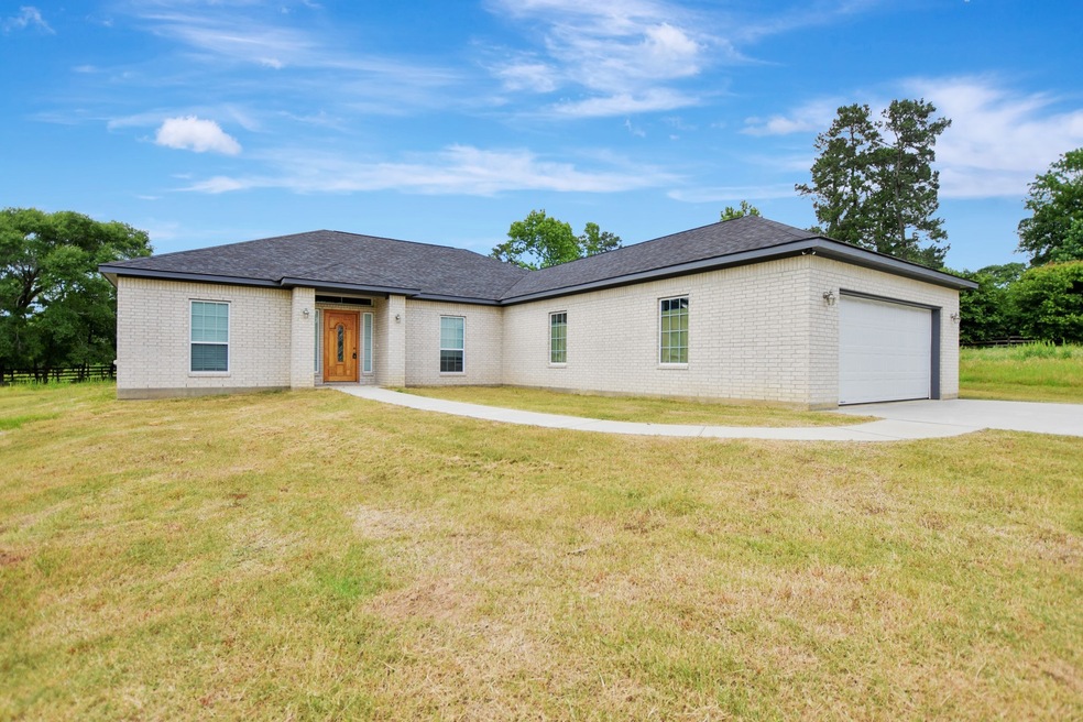 903 Rustic Oaks Dr, Magnolia, TX 77354 - photo 1