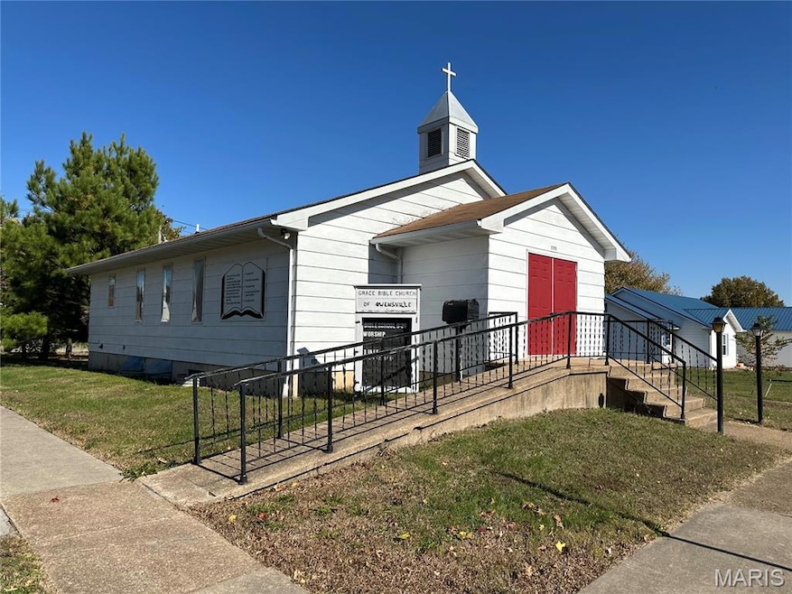 View of front of property with a front yard