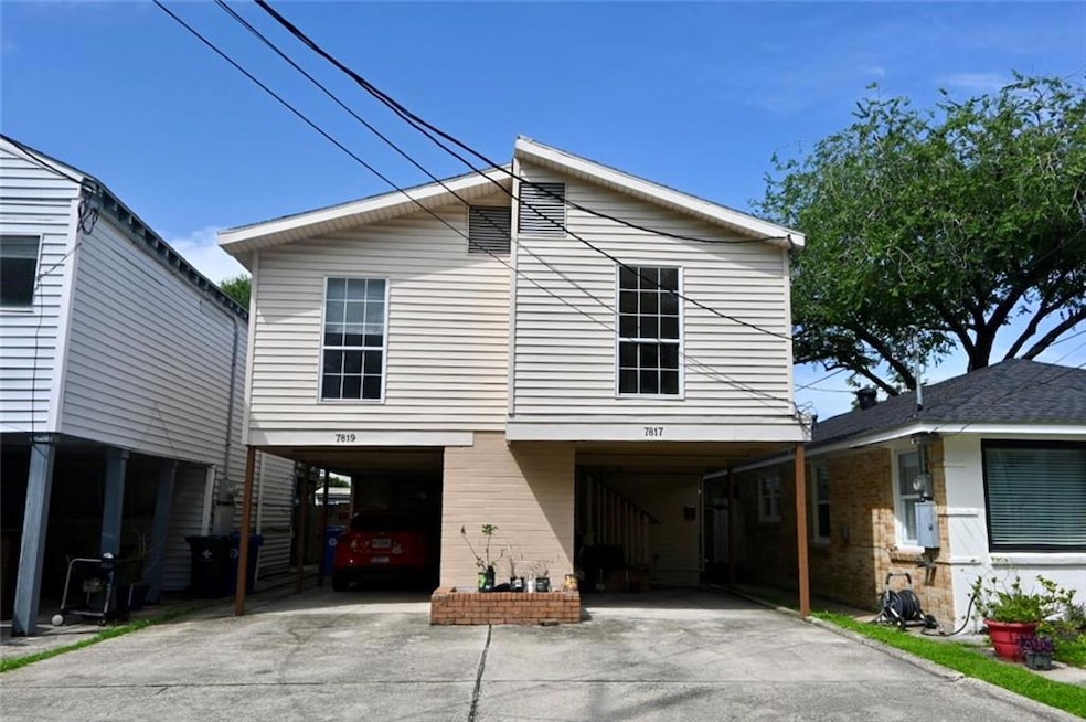 Upper unit with covered off street parking