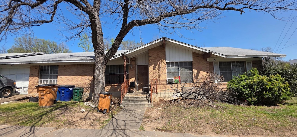 View of front of property featuring brick siding