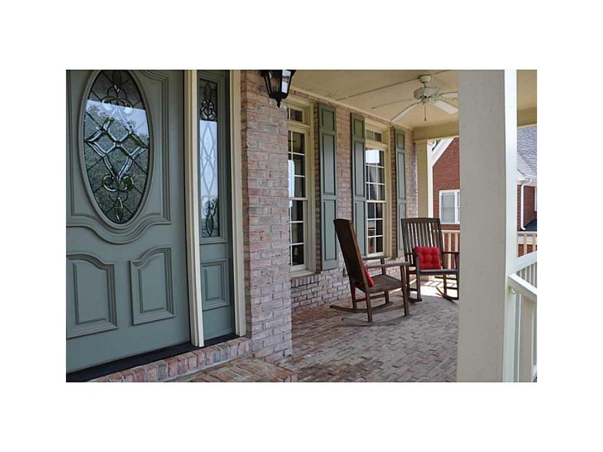 Exterior Front. ROCKING CHAIR COVERED FRONT PORCH 