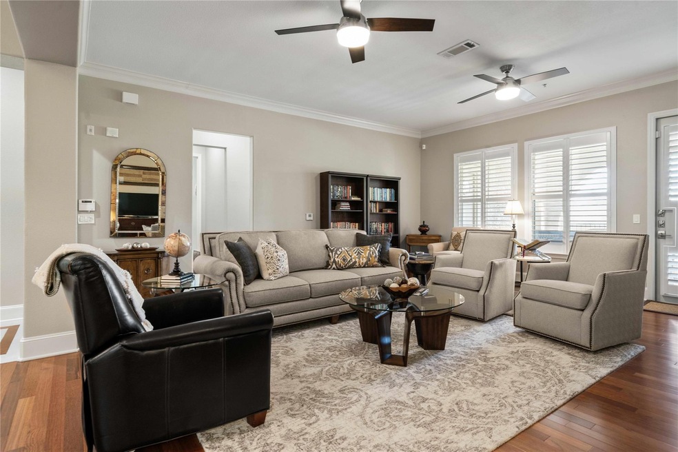 Living room with hardwood / wood-style floors, cei