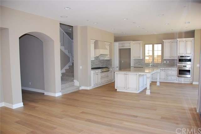 Warm & welcoming wood flooring invites you and you