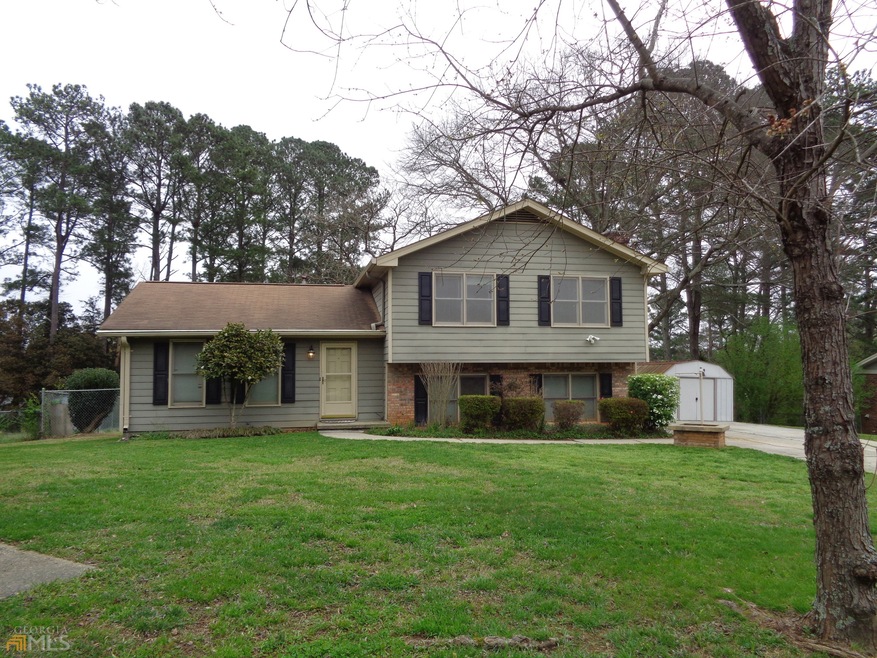 Brick & Hardiplank split level on .46A level lot w