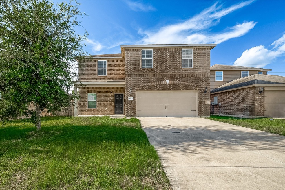 2-STORY HOME WITH ATTRACTIVE BRICK ELEVATION AND C