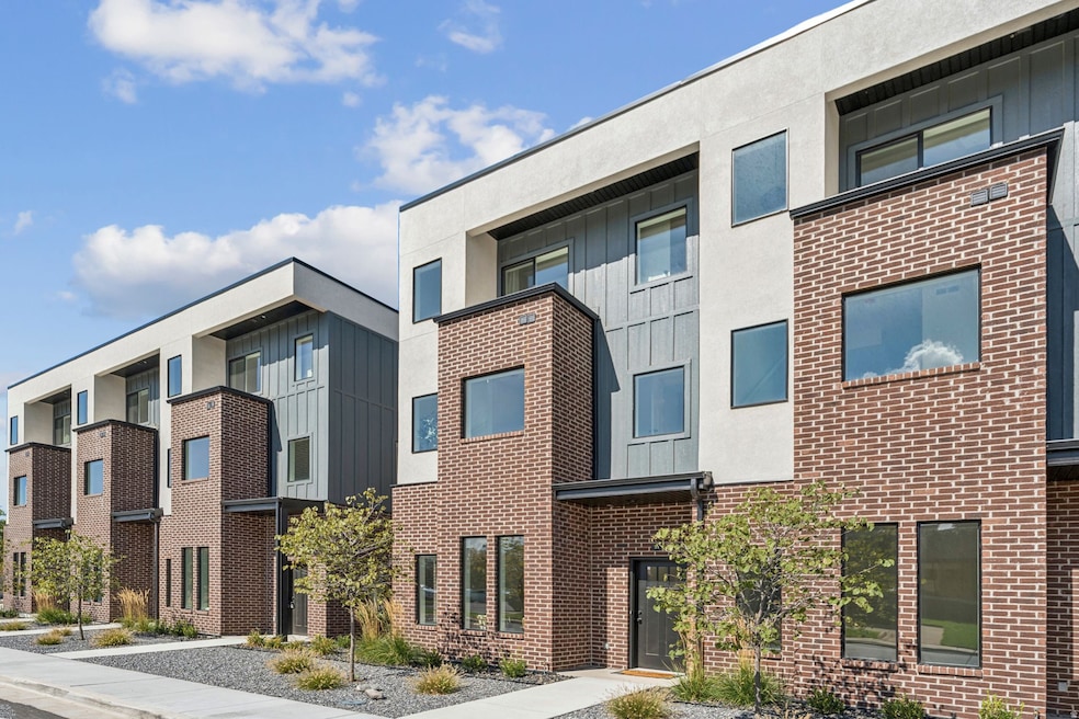 View of property with a residential view
