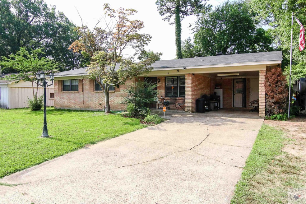 210 W Pioneer St, Wake Village, TX 75501 - photo 1