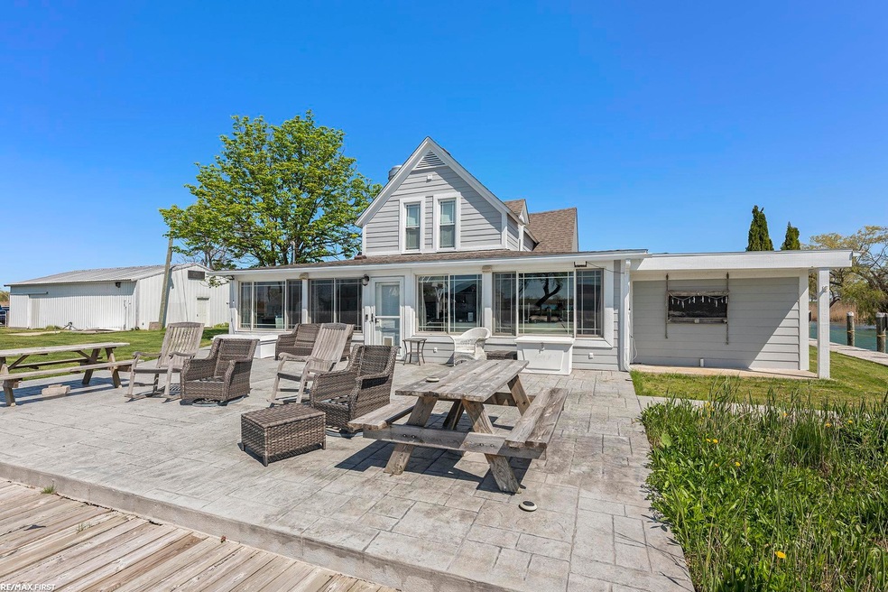 7650 S Channel Dr, Harsens Island, MI 48028 - photo 1