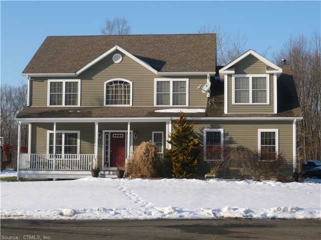 Exterior Front. Attractive colonial set towards th
