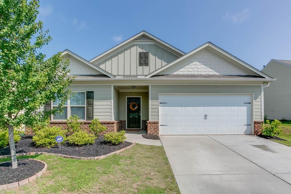 Adorable ranch in the Maple Park community.