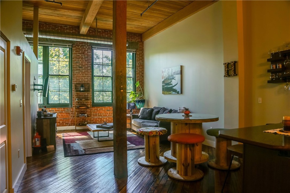 Come home to Unit 204 of the Lofts at Allen Street