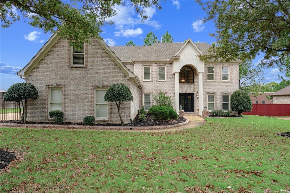 View of front of home featuring a front lawn