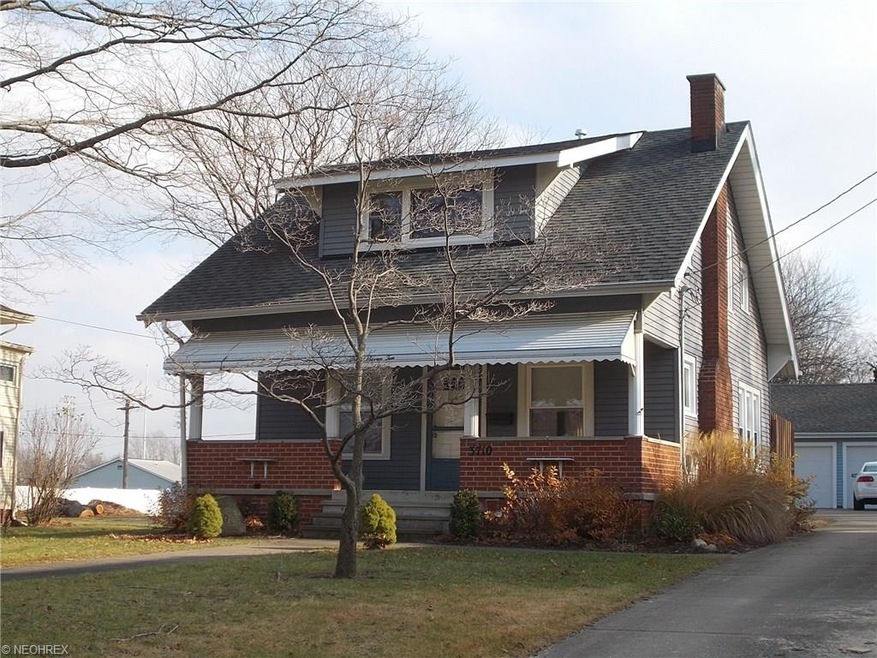 Front view the house with the great porch to sit o