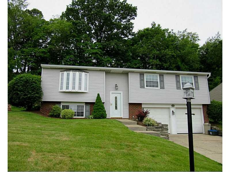 Exterior Front. Nicely manicured front yard and gr