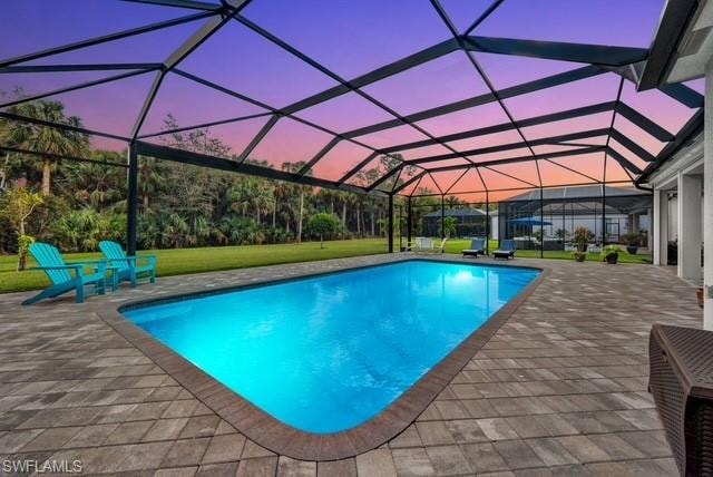 Pool featuring a patio area, panoramic screen encl