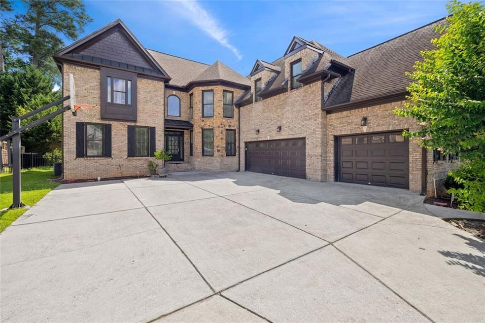 585 Settles Brook Ct, Suwanee, GA 30024 - photo 1