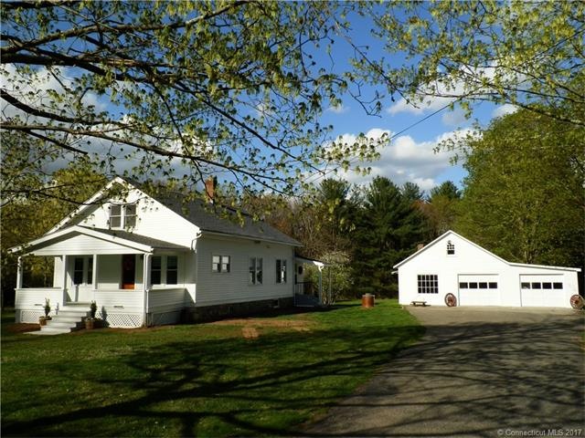exterior front and garage with workshop