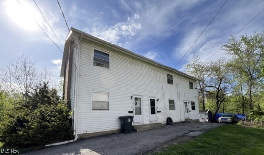 Rear view of house with a patio