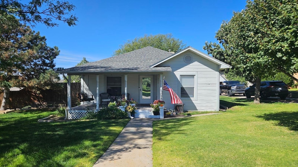 209 N Birch St, Cimarron, KS 67835 - photo 1