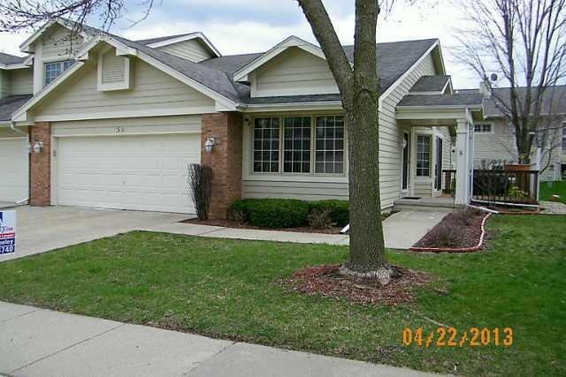 Exterior Front. Easy access garage, and office has