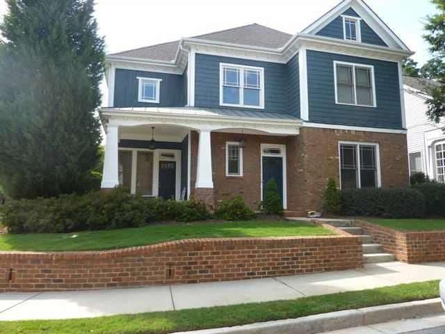 Exterior Front. Crafstman home in Olmstead at East