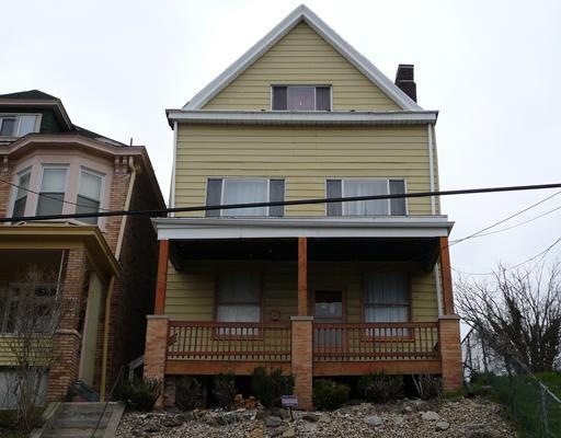 Exterior Front. Large covered front porch.