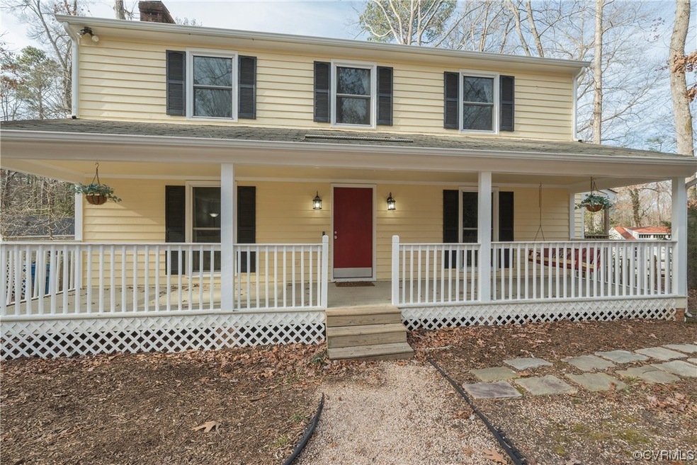 Country-style home with covered porch