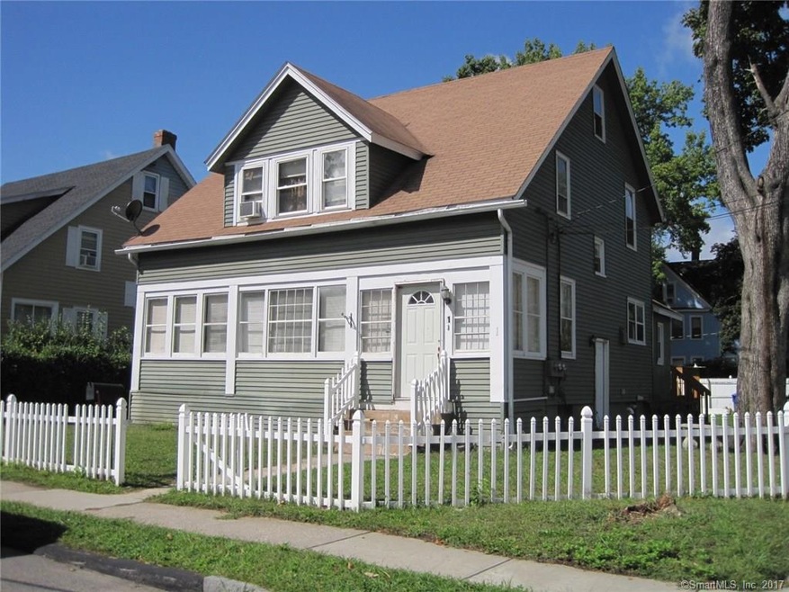 Pretty picket fence defines front yard