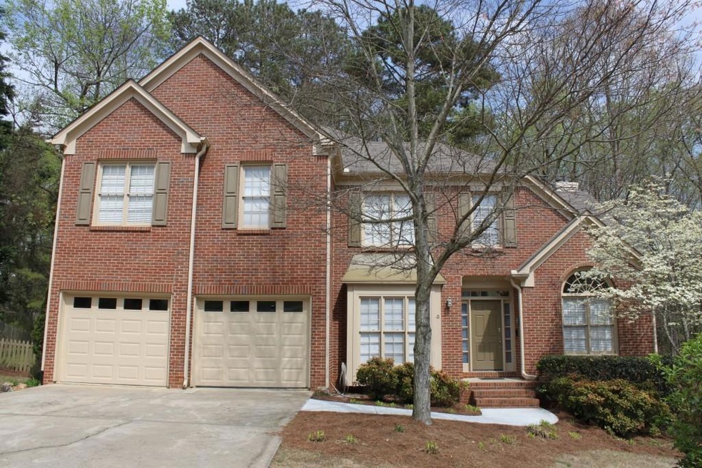 Brick front home on cul-de-sac lot.