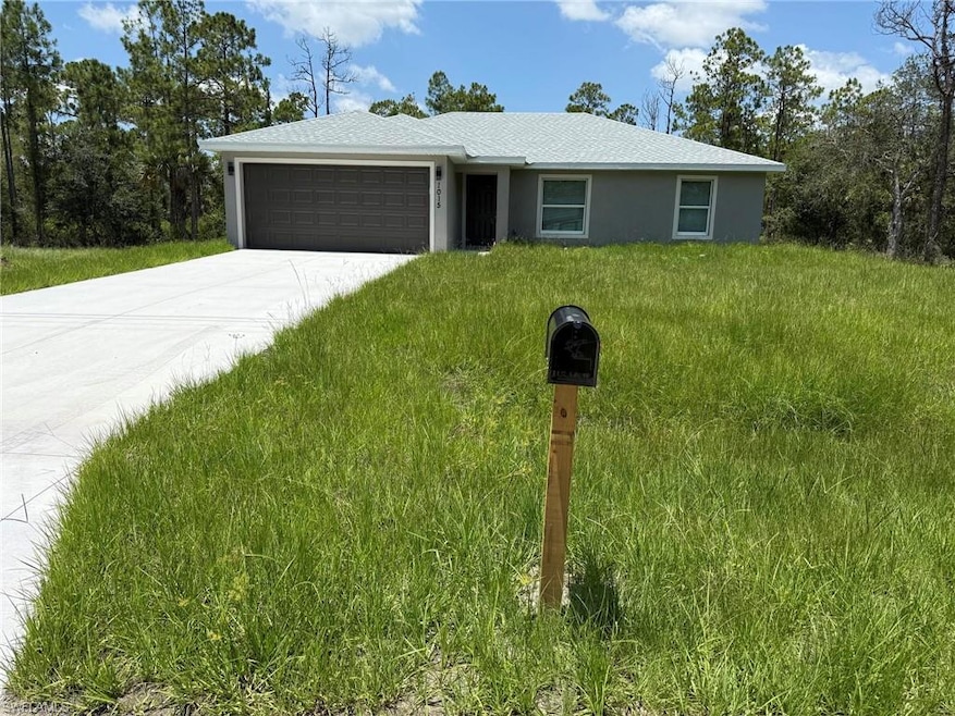 1015 Cortez Ave, Lehigh Acres, FL 33972 - photo 1