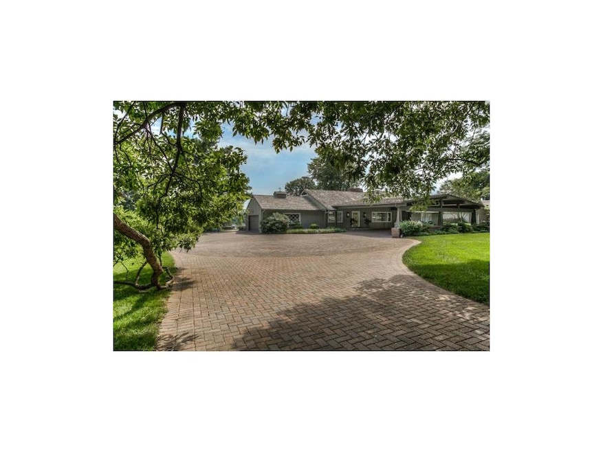 Most Stunning Lake Setting in Old Leawood!