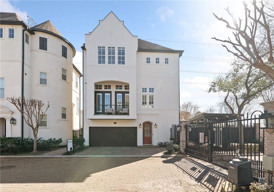 View of front of house with a fenced front yard, s