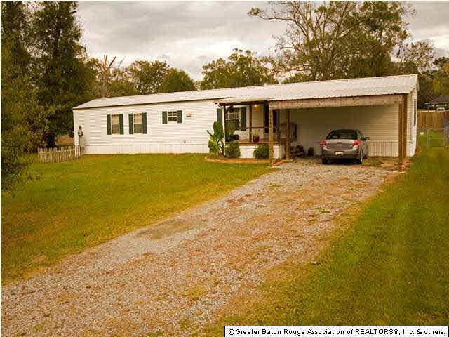 front view with carport and porch