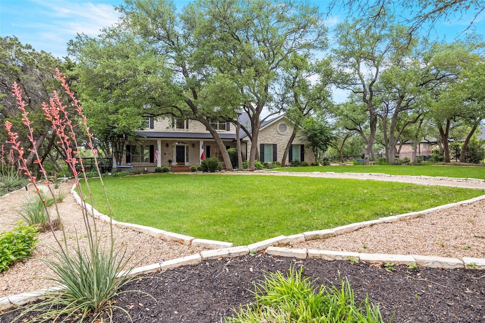 View of front of house with covered porch and a f