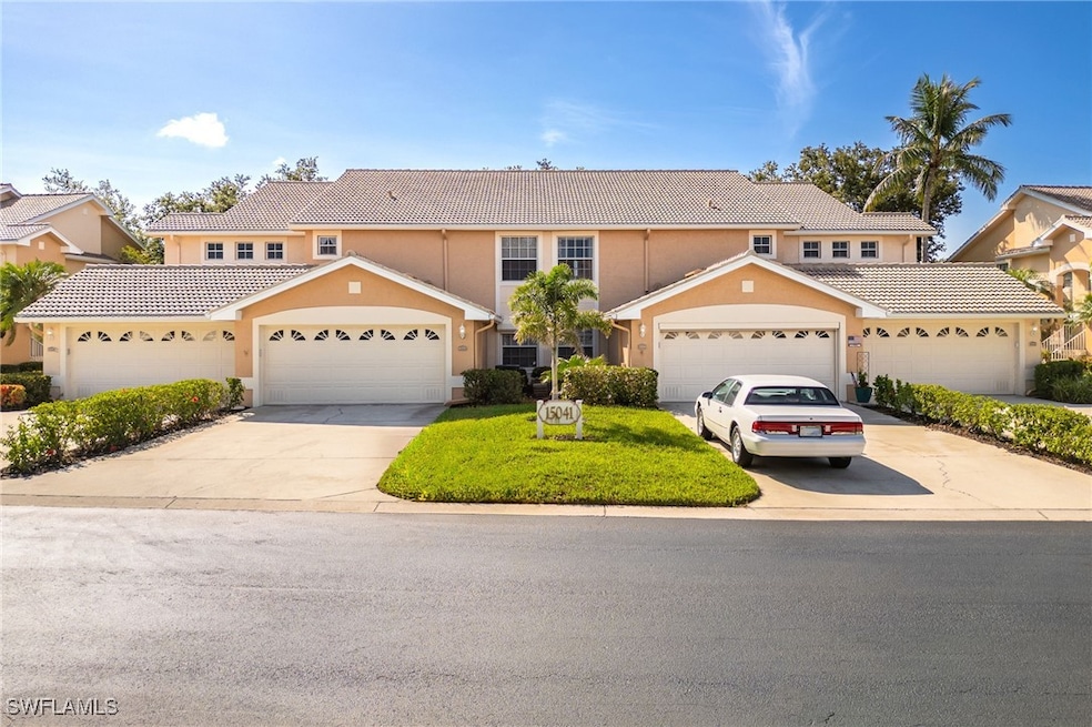 View of front of house featuring concrete driveway