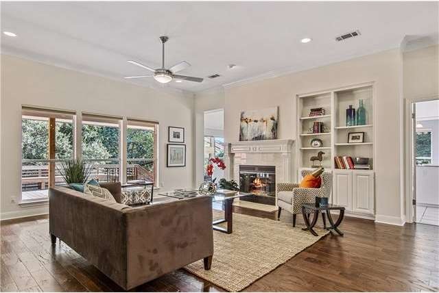 The rich wood floors and neutral walls add sophist