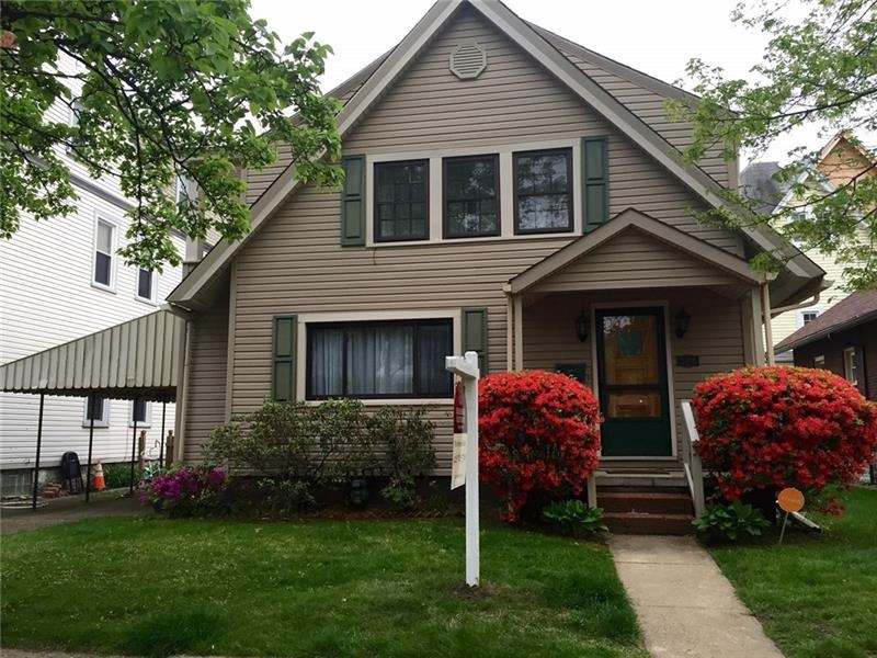 Great curb appeal! This home has a carport and nic