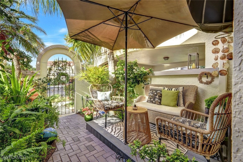View of patio / terrace with an outdoor living spa