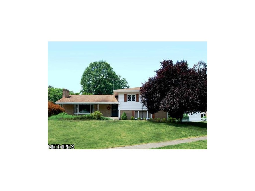Located in the heart of Revere Village, this 4 lev